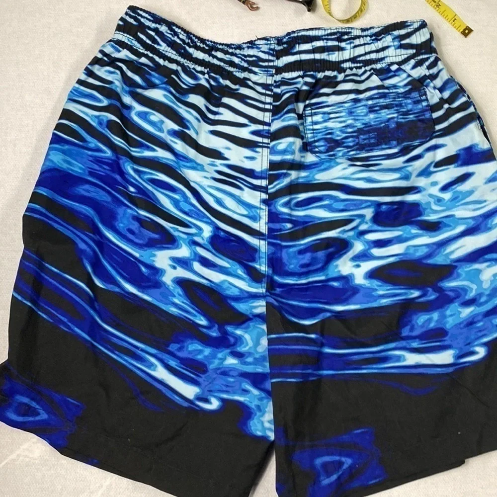 Joe Boxer Men’s Swim Trunks size Medium. (BE)